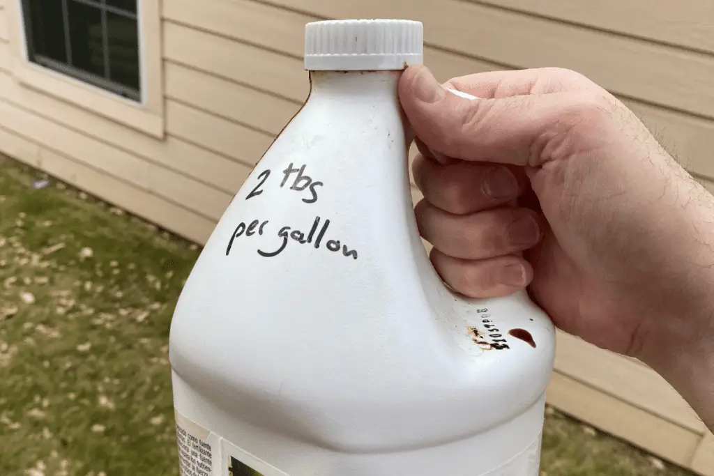 Bottle of Fish Fertilizer with Sharpie on the Side