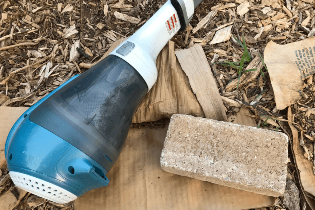 Hand vacuum and brick used to smash stink bugs