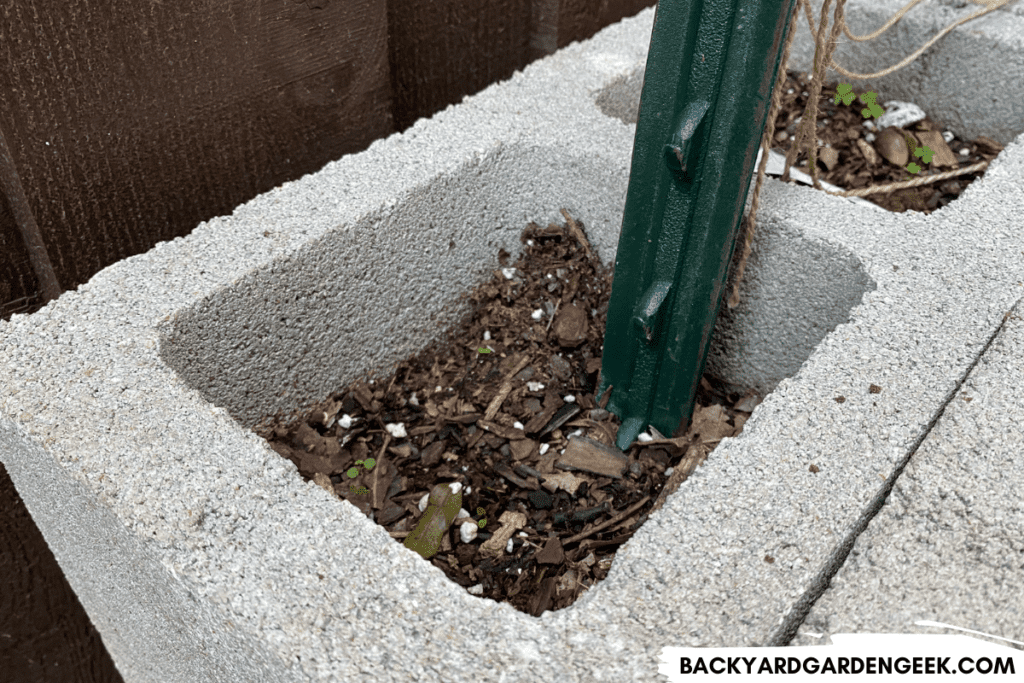 Support Post in Concrete Block Hole