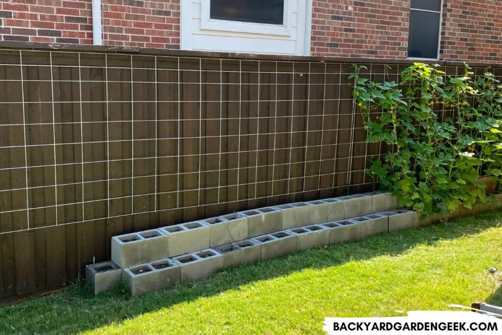 Concrete Blocks Along Fence Line