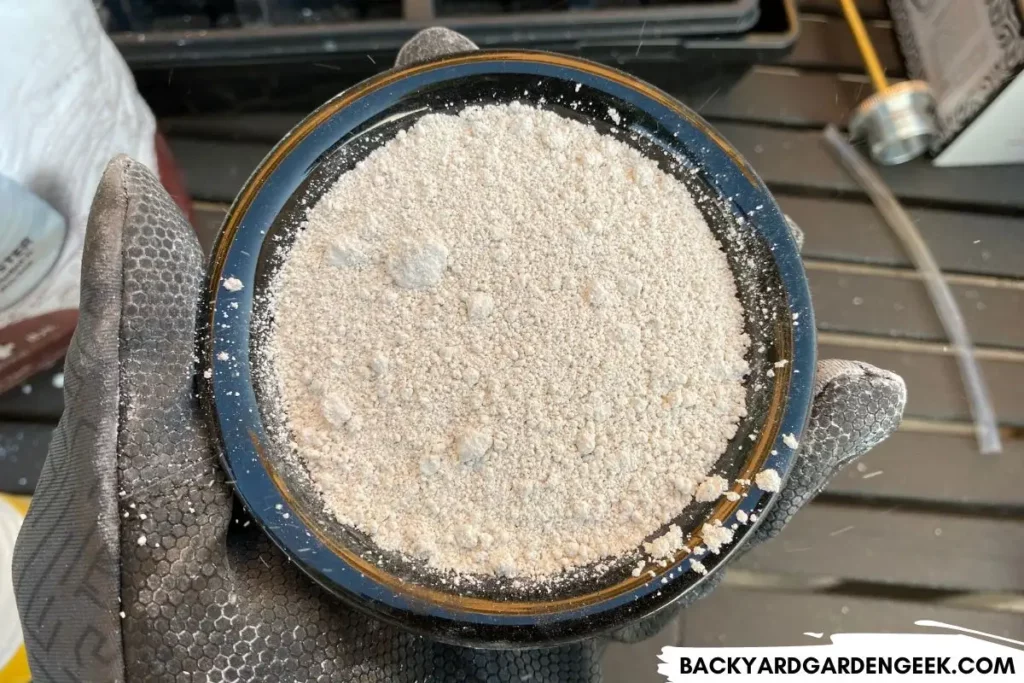 Close Up of a Black Bowl of Diatomaceous Earth