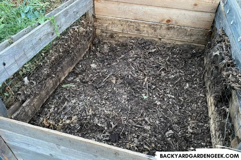 Compost Bin with Chicken Wire and Wood Slats