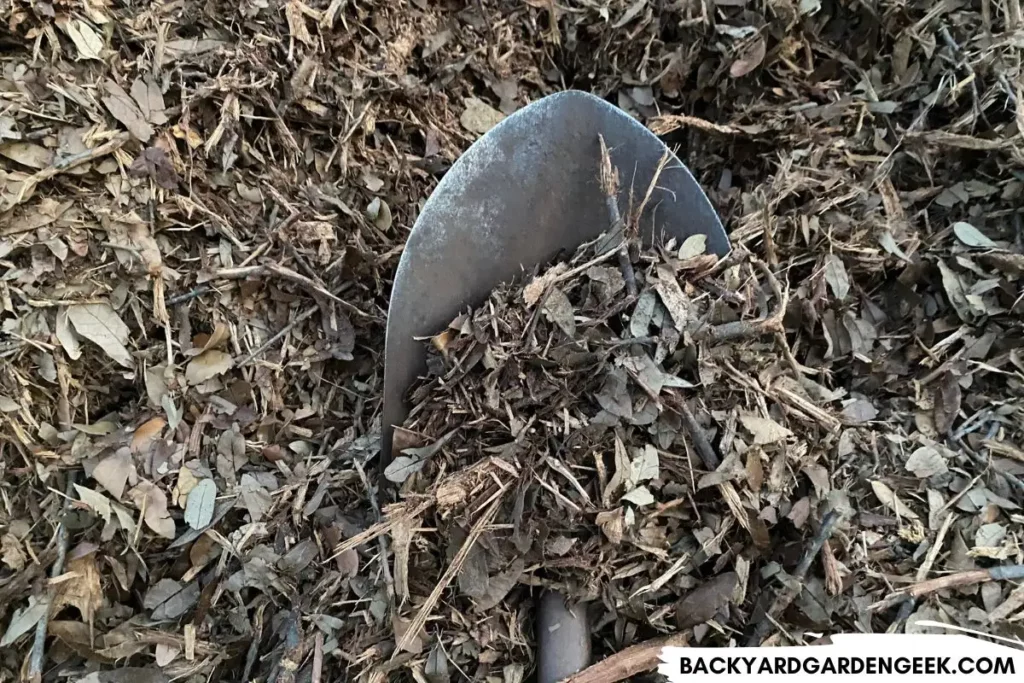 Shovel in Wood Chips